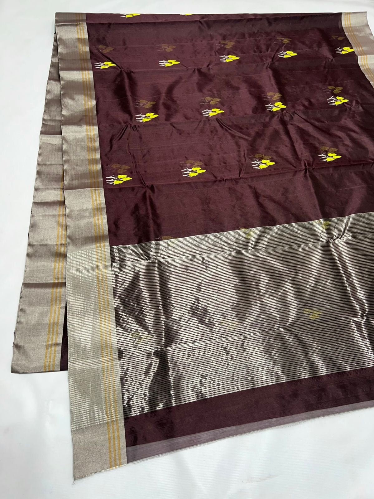Pure Silk Chanderi – deep brown  with Wheat-Sheaf Buttas
Silver Kaddi Border & Shimmering Silver Tissue Pallu ✨
Silk Mark Certified • Free Shipping within USA • Ships in Two Weeks