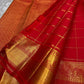 Srija – Red-Orange zari kattam  Kanchipuram Pure Silk Saree with Zari Checks, Kamalam Buttas & Vanasringaram Border