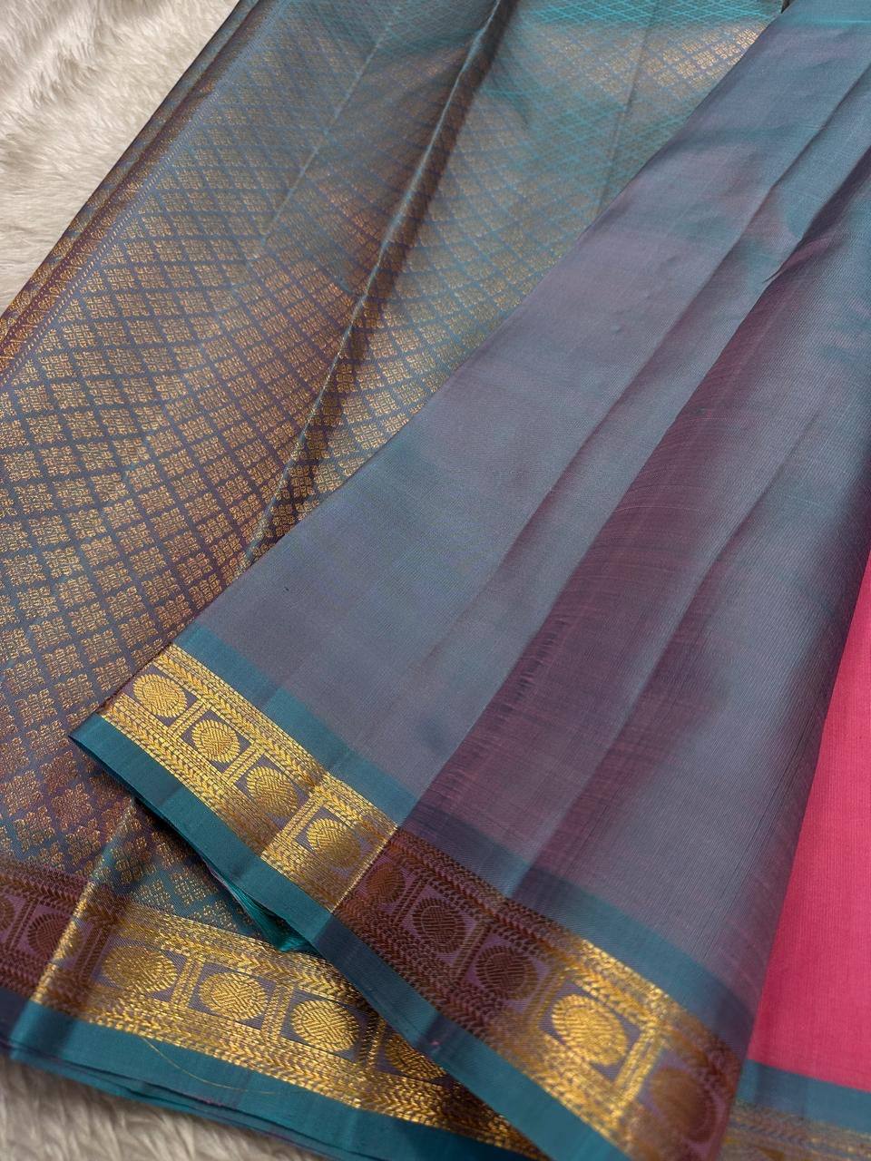 Varnam – Pastel Pink Kanchipuram Silk Saree with Sky Blue Rudraksha Border & Grid Zari Pallu | Baby Kamalam Buttas | Pure Handloom Elegance