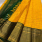 Manjal Pachai Kattam
Pure Kanchipuram Silk Saree – Marigold Yellow Body with Green Checks & Petite Zari Buttas
Deep Green Korvai Borders with Rich Gold Zari Weave & Traditional Elephant Motifs
Silk mark certified , ships in 2 weeks