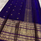 Traditional Kanchipuram Korvai saree in jewel-toned violet with heritage Gandaberunda craftsmanship