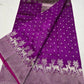 Folded Royal Purple Chanderi saree showing silver floral buttas and woven border detail