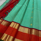 Poomugam Pachai
Pure Silk in Tender Mint & Kumkum Red
Zari-Woven Grandeur in korvai  Contrast