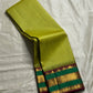 Gita  
Pure Silk Kanchipuram Saree  
Sampanga & Pea Green Podi Kattam  
Arakku Border with Triple Zari Bands