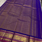 ⸻

Ivory Glow ✨ – Pure Kanchipuram Silk Saree in Ivory

Korvai Royal-Purple Border with Elephant & Peacock Zari Panels; Magenta Selvedge
Body with Gold Coin & Paisley Buttas
Grand Royal-Purple Brocade Zari Pallu with Hand-knotted Tassels