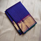 Sapphire Zari Kattam – Pure Kanchipuram Silk Saree
Brilliant Sapphire Blue Body with Gold Zari Checks
Broad Golden Border with Magenta Highlights & Temple Motifs
Royal Magenta Pallu with Lustrous Zari Stripes

Silk Mark Certified, delivery in 2 weeks