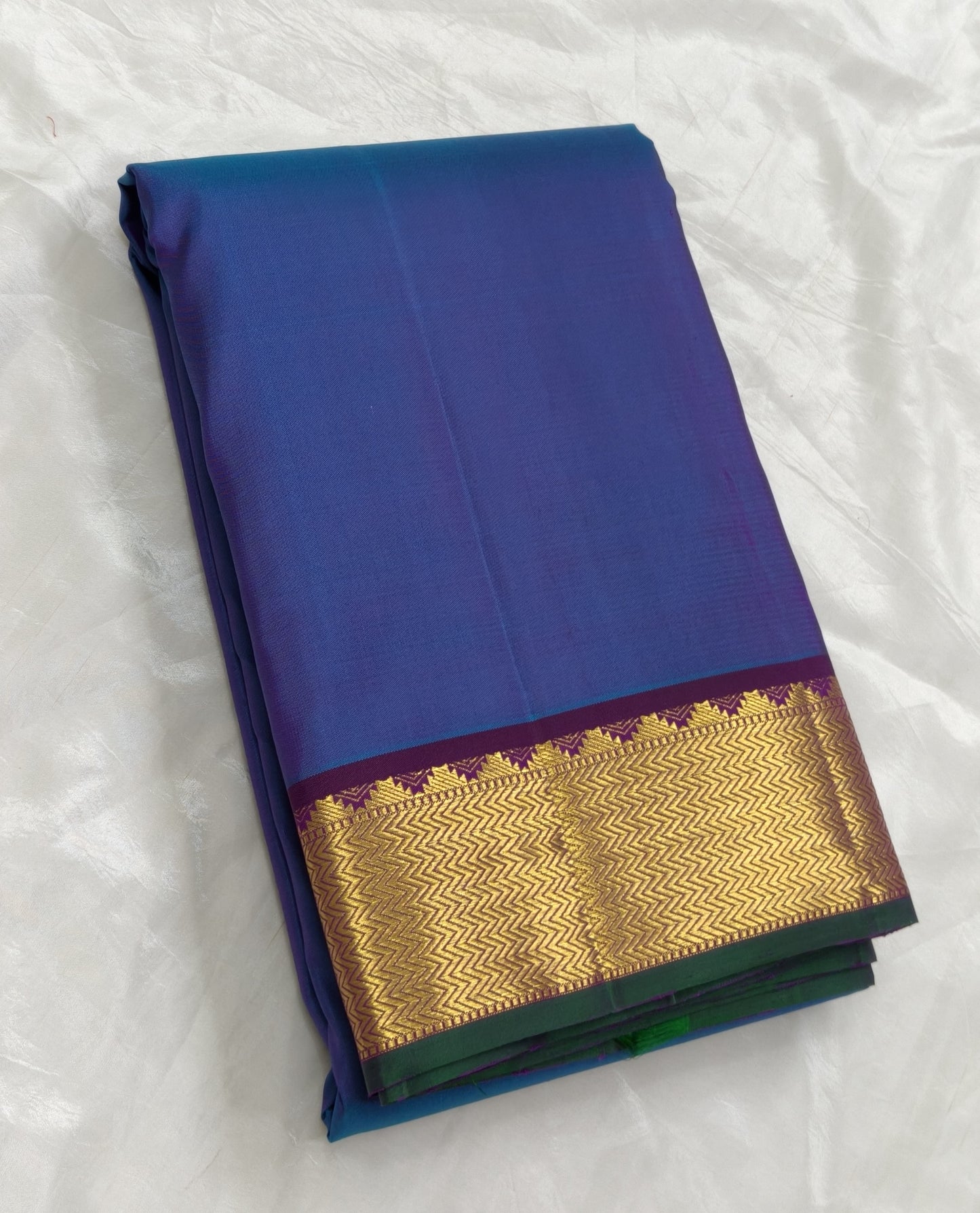 Pure silk Kanjivaram saree in midnight indigo blue with traditional zari detailing – close up
