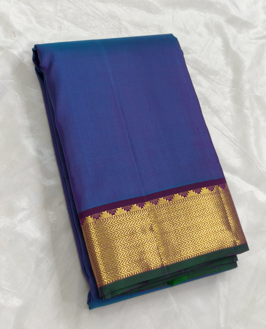 Pure silk Kanjivaram saree in midnight indigo blue with traditional zari detailing – close up