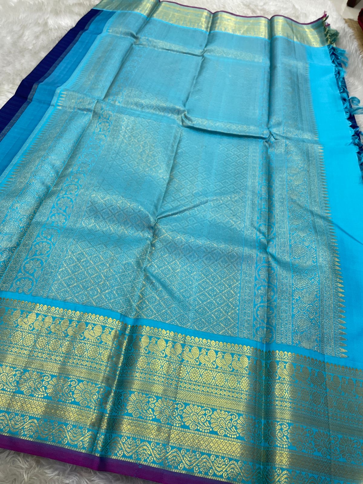Ramya – Royal Blue Kanchipuram Pure Silk Saree with Zari Peacock Buttas, Sky Blue Varisaipet Border & Pastel Blue Pallu”