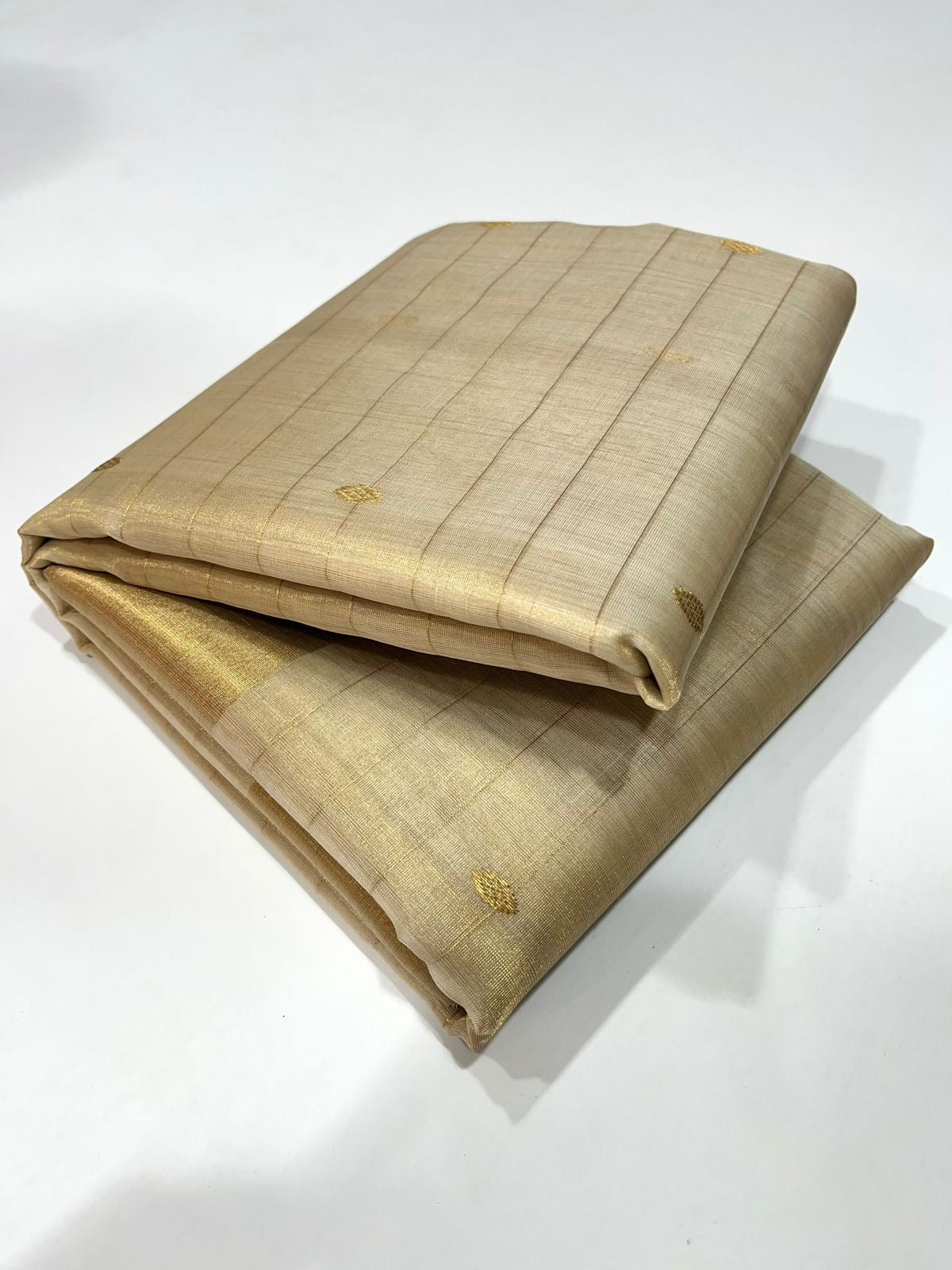 ✨ Pure Silk Chanderi Saree: Swarna Rekha (Champagne Gold Whisper)
Handwoven in luminous champagne-gold with zari buttas and pin-check texture ✨
Silk Mark Certified • Blouse Stitching Available ($30) • Free Shipping within USA • Ships in Two Weeks