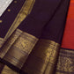 Shyama – Dusky Tangerine Kanchipuram Silk Saree with Purple Vanasringaram Border & Mayil Buttas