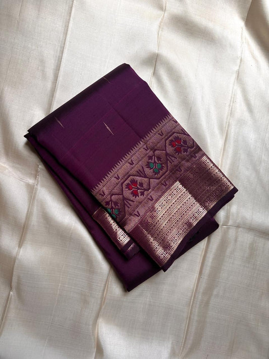 Vibha plum - A Deep Plum Pure Kanchipuram Silk Saree Blending the Grandeur of South Indian Weaving with Paithani-Inspired Floral Zari Borders and a Lustrous Rose Gold zari Pallu