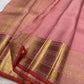 Malini – Pale Pink Pure Silk Kanchipuram Saree with 4G Gold Zari Lotus Buttas and Temple Motif Border
A delicate pale pink drape handwoven in pure silk with shimmering 4G gold zari lotus buttas all over the body.