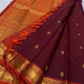Maroon Kolam Korvai – deep wine-maroon body with tiny kolam buttas

Contrast burnt-orange korvai border with temple triangles & intricate kolam motifs

Silk Mark Certified | Fall & Pico Done | Blouse Stitching Available ($30)

Free Shipping 2 weeks