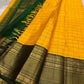 Manjal Pachai Kattam
Pure Kanchipuram Silk Saree – Marigold Yellow Body with Green Checks & Petite Zari Buttas
Deep Green Korvai Borders with Rich Gold Zari Weave & Traditional Elephant Motifs
Silk mark certified , ships in 2 weeks
