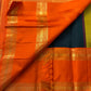Divya – Handwoven Black Kanchipuram Pure Silk Saree with Mayil & Floral Butta, Finished with a Bold Rettapettu Border