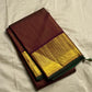 Shyama Vairaoosi — Pure Silk Kanchipuram

Deep Shyama brown with micro Vairaoosi pinstripes

Temple-column antique gold zari border, bottle-green selvedge

 Grand striped zari pallu with hand-tied tassels

Silk Mark Certified • free shipping