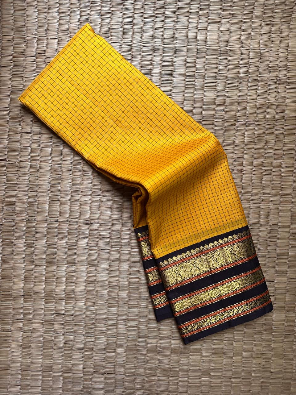 Yellow checkered Kanchipuram silk saree with black and 