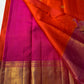 Kalpana  
Pure Silk Kanchipuram Saree  
Burnt Orange with Golden Buttas  
Intricate Magenta & Gold Zari Border