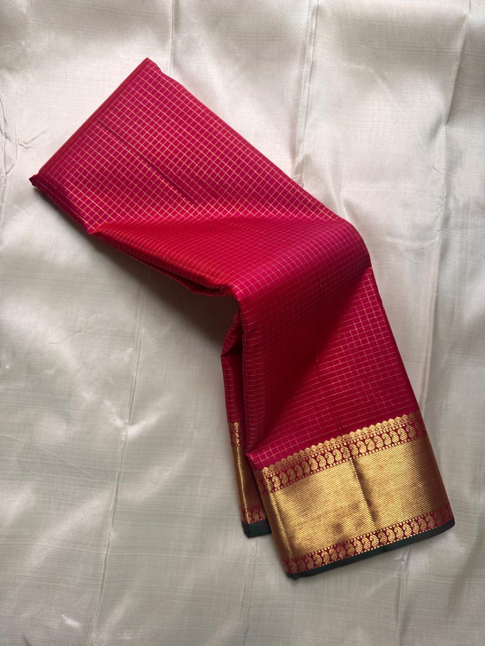 Pomegranate Pink Kattam
Pure Kanchipuram Silk with Gold Zari Grids
Festive, Heirloom-Bright, Temple-Bound Radiance