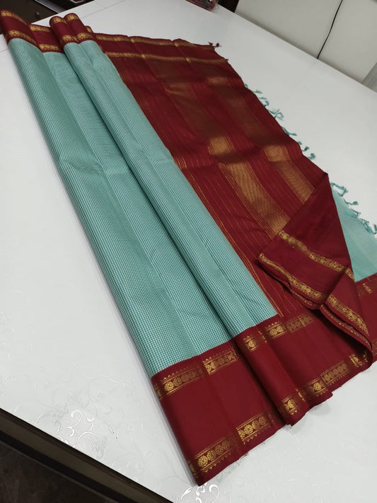 Mint kasa kasa kattam with red rettapet border pure silk Kanchipuram saree
