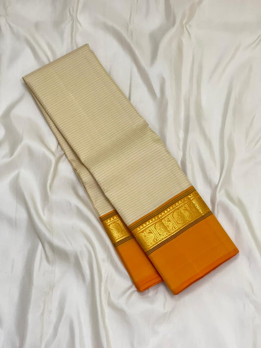 Sweta Kanakam Kattam — Pure Kanchipuram Silk Saree
Ivory Pinstripes × Marigold border with Antique-Gold Zari Border
Silk Mark Certified • Free Shipping within USA • Ships in Two Weeks