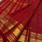 Vermilion Podi Kattam 🌺 Pure Silk Kanchipuram Saree

All-over zari pinstripes & mini podi kattam checks ✨

Broad antique-gold borders with chakram medallions 🪙

Silk Mark Certified ✅ | F
