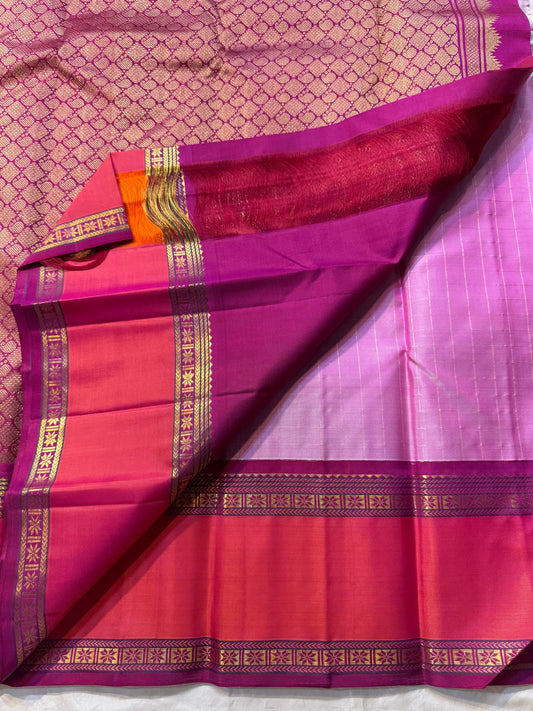 Gulabi Kattam – Pure Kanchipuram Silk Saree
Pastel Pink Body with Fine Zari Grid Checks
Raspberry Korvai Borders with Floral Zari Work
Grand Raspberry–Magenta Brocade Pallu
Silk Mark Certified | Fall & Pico Done | | ships in 2 weeks