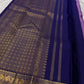 Lilac Mayil Pushpam – lilac-purple body with navy korvai borders

Pure Kanchipuram silk • gold zari pushpam (flower) buttas all over

Grand navy brocade pallu with diamond jaal • contrast blouse with border

Silk Mark Certified | Fall & Pico Done |