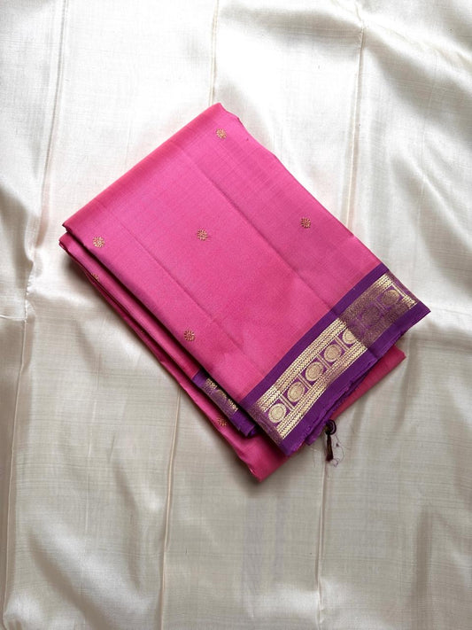 Varnam – Pastel Pink Kanchipuram Silk Saree with Lilac Purple Rudraksha Zari Border & Ornate Kamalam Pallu | Pure Handloom Heritage