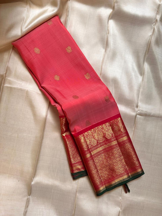 Lotus pink kamalam peacock butta  peacock motif   border and green selvedge pure silk Kanchipuram saree