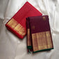 Madhuvanam — Pure Silk Kanchipuram Saree
Brownish-plum body with gold buttas & kattam checks ✨
Antique-gold korvai borders & grand magenta zari pallu 🌸
Silk Mark Certified • Ships in Two Weeks • Free Shipping within USA