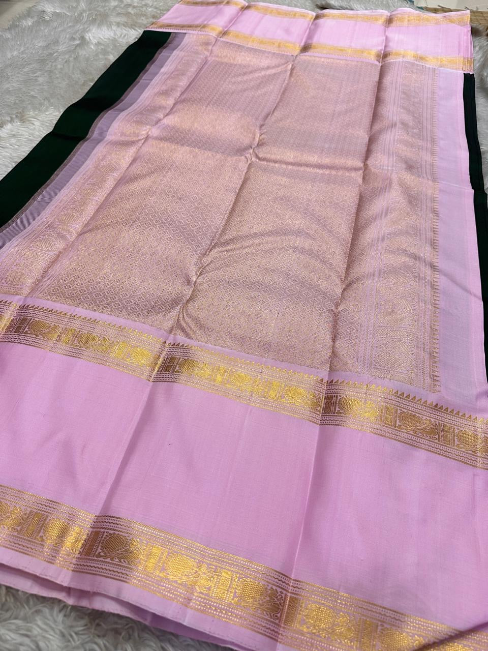 Wide pallu view in lavender zari with geometric weave and gold accents