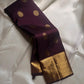 Cholai – Orchard at Dusk ✨ A pure Kanchipuram silk in deep purplish-brown, adorned with regal Gandaberunda 🦅 and delicate Kamalam 🌸 motifs. Its gold zari border layers Varisaipet, mango paisley 🥭, Rudhraksham, and Vanki for a true heritage masterpiece