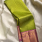 Harita – Chartreuse Green & Pastel Pink Kanchipuram Pure Silk Saree with Floral Jaal & Mayil Border
A refreshing chartreuse green drape with intricate silk thread floral jaal work.
Finished with pastel pink mayil borders and a thick woven Pallu