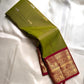 Golden Emerald Gleam ✨ – Pure Kanchipuram Silk Saree
Parrot Green & Turmeric Shot with Gold & Silver Leaf Buttas 🌿
Crimson Red Korvai Border with Temple Peaks  ❤️
Grand Crimson Pallu 🌟

Silk Mark Certified, delivery in 2 weeks