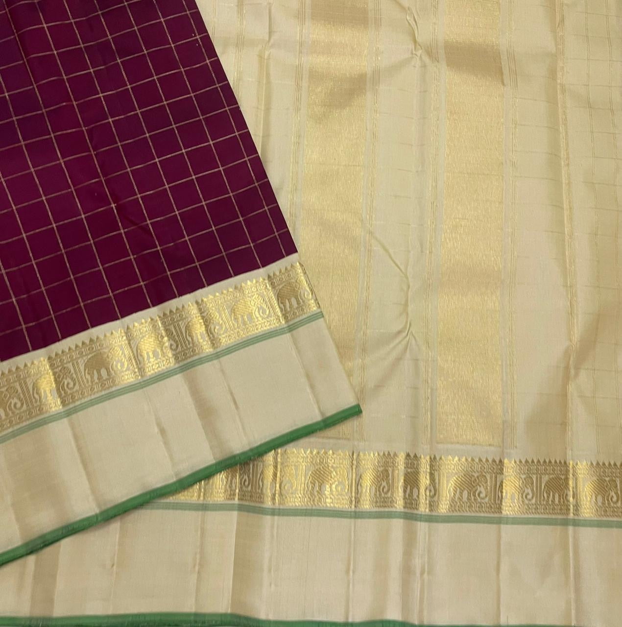 Kanchana Checks — Pure Kanchipuram Silk
Jamuni Gold Grid × Ivory border  with Gaja Zari
Ivory Zari Pallu • Contrast Jamuni Blouse
Silk Mark Certified • Free Shipping within USA
Dispatch in 1 Week • Ships in Two Weeks
