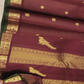 Coffee brown Zari kattam with paisley peacock border kamalam butta and green selvedge , kilo kanjivaram Pallu in pure silk