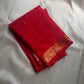Mahima –red
A luminous red pure silk Kanchipuram drape adorned with delicate baby  kamalam buttas. The petite border features muthu seer and zari-woven elephants with floral vines. Its grand pallu showcases annams, golden grids, and Rudhraksham seer.