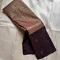 Mauve Mayil – Pure Kanchipuram Silk Saree with Plum Body & Dusty-Rose Pallu
Deep plum silk adorned with delicate golden buttas.
Broad antique zari borders with kattam.
Dusty-mauve pallu in intricate vine jaal. Silk Mark Certified, delivery in 2 weeks