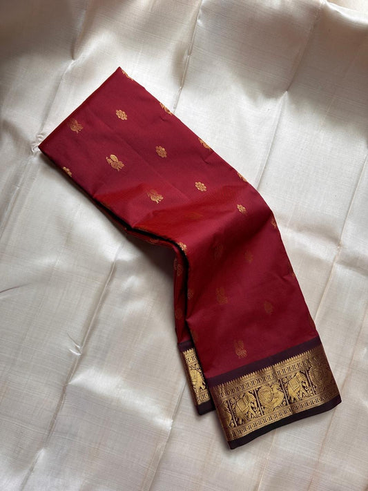 Maroon Yali Butta – Pure Korvai Kanchipuram Silk Saree
Deep maroon body with delicate gold zari paisley & floral buttas
Contrast chocolate-maroon korvai border featuring bold yali motifs
Silk mark certified- ships in 2 weeks
