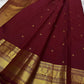 Deep brown small flower motif with vanasringaram and Rudhraksham border pure silk mark certified Kanchipuram saree