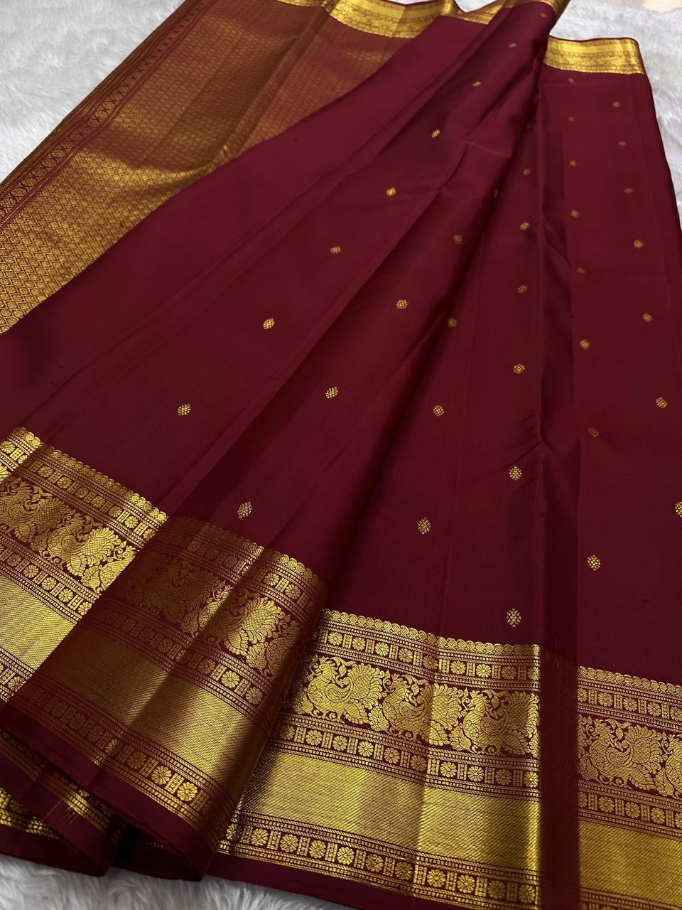 Deep brown small flower motif with vanasringaram and Rudhraksham border pure silk mark certified Kanchipuram saree