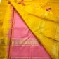 Kanakam mellow yellow body with zari rosette buttas and antique-gold borders; intricate pallu in diamond brocade with tassels.rose pink blouse 
Silk Mark Certified • Free Shipping within USA • Ships in Two Weeks ✅