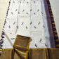 Open body view of ivory Kanchipuram silk saree featuring scattered horse and parrot motifs with gold zari borders on both sides