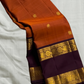 Poovizhi Rust Orange — Pure Kanchipuram Silk Saree
Deep aubergine body with rust-orange korvai borders & rich zari floral motifs
Silk Mark Certified • Blouse Stitching ($30) • Free Shipping within USA • Ships in Two Weeks