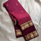 Saanvi – Lotus Pink & Magenta Shot Kanchipuram Silk Saree
Saanvi features zari buttas of mayils and chakrams across the body. A deep wine rettapettu border showcases twin peacocks in a temple arch. The pallu mirrors this grandeur with sorgavasal motifs !