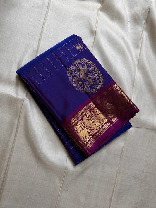 Sorgavaasal Kili , stunning motif in  MS blue and purple zari kattam zari woven yazhi buttas in pure silk kanchipuram