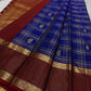 Sapphire Ruby Kattam – Pure Kanchipuram Silk Saree
sapphire blue body with gold kattam checks & buttas
Contrast ruby-red korvai borders with intricate gold zari weave
Grand ruby-red pallu with floral motifs
Silk Mark Certified | ships in 2 weeks