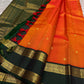 Riya – Orange Silk Saree with Dark Green Zari Border
Radiating warmth and festive charm, Riya  glows in a rich ombré of orange and vermilion, adorned with dainty gold butta motifs that shimmer gently with movement.